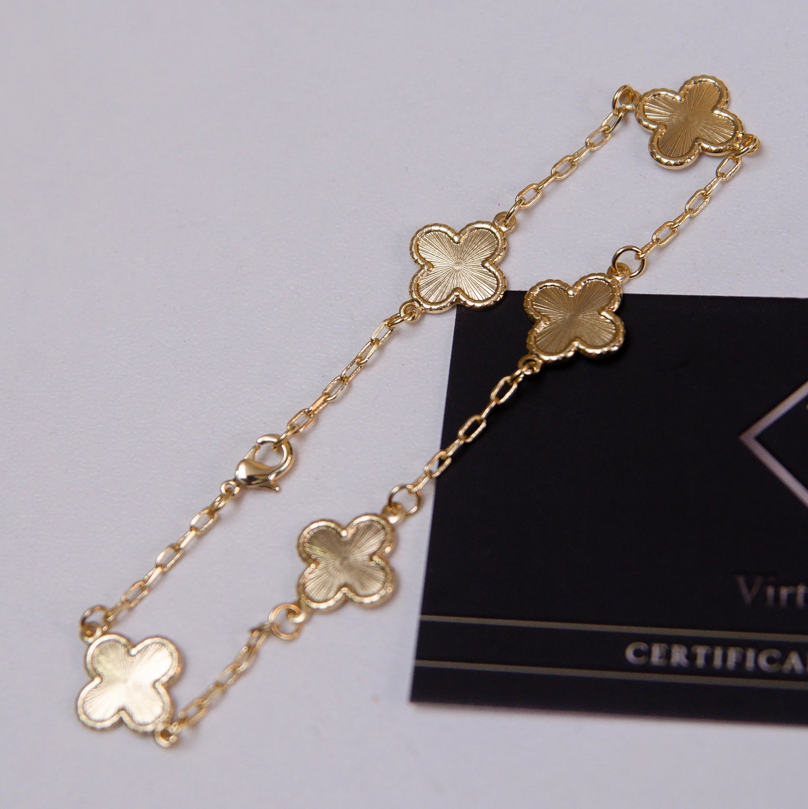PULSEIRA 5 TREVOS FRISO BANHADO A OURO 18K